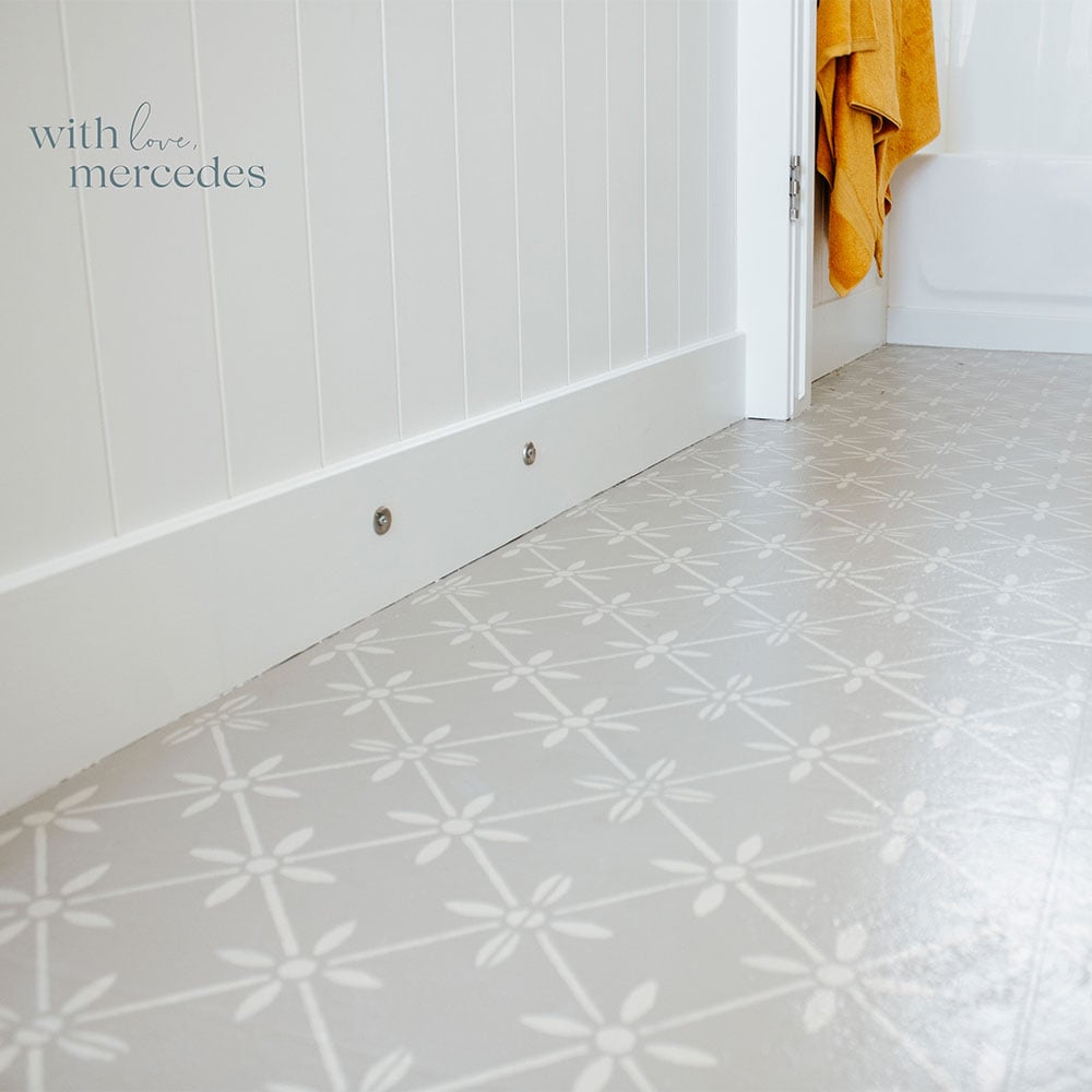 wallflower tile stenciled bathroom floor
