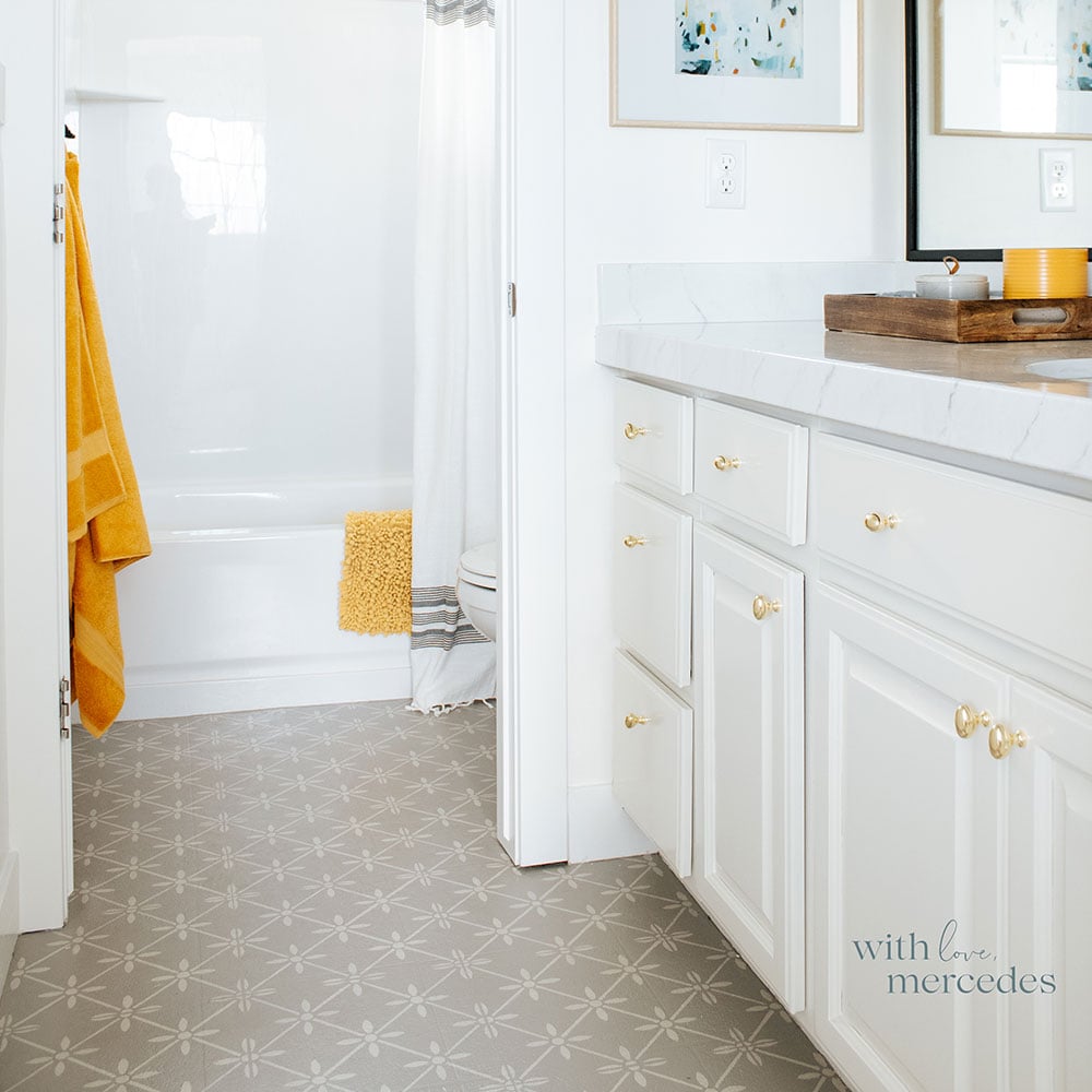 painted bathroom tile with wallflower tile stencil